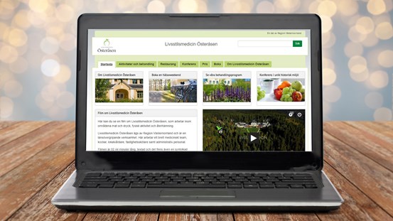 Laptop som visar österåsens nya hemsida