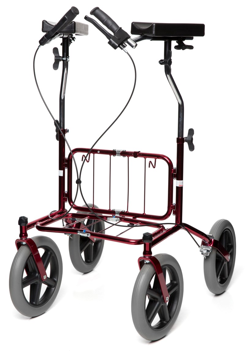 Mörkröd fyrhjulig rollator, stora hjul. Höga armstöd med skålade underarmsstöd. Handbromsar. Krokar och underrede för korg. 