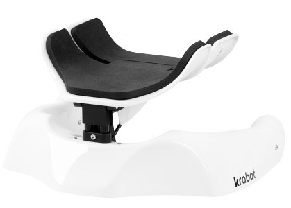 Krypvagn för små barn med nedsatt motorisk funktion.  Komplett med rem för lår. Krypvagnens färg är vit och svart.